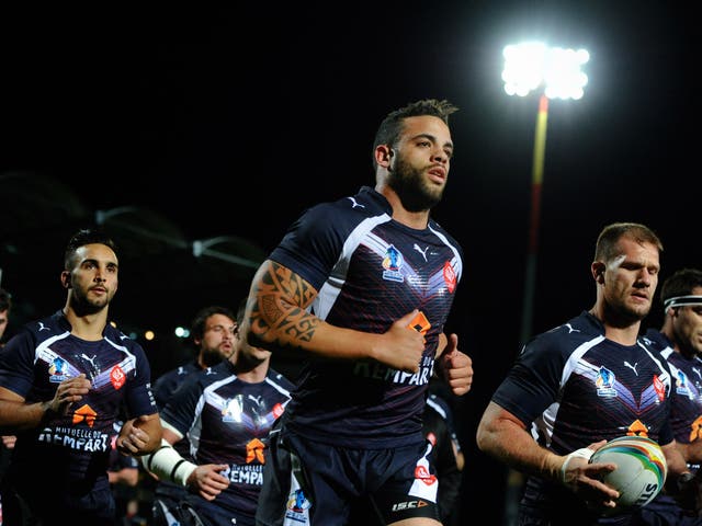 France's rugby league team warm-up before their World Cup match against Samoa