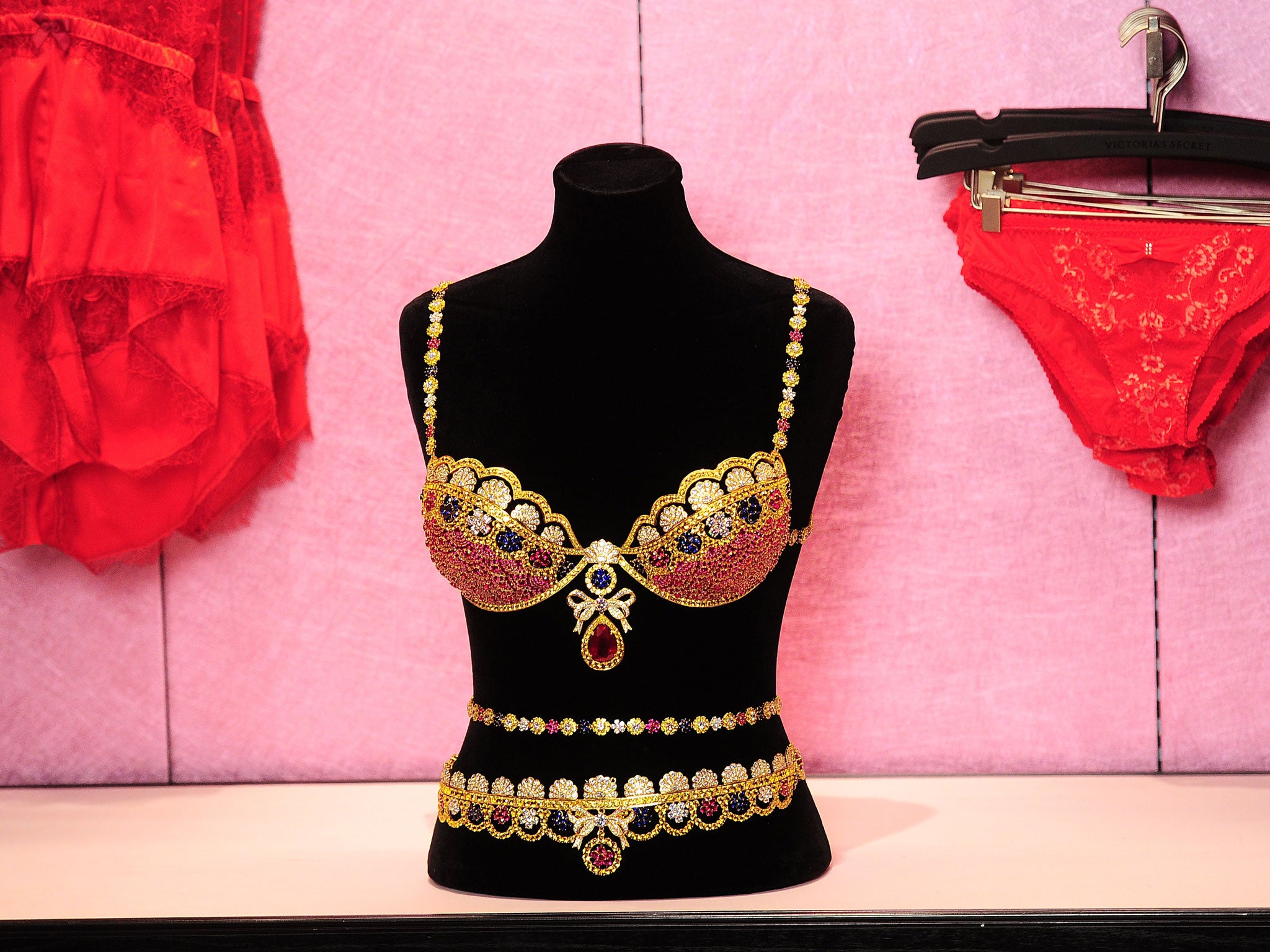 The Royal Fantasy Bra Gift Set includes a custom Dream Angels Demi silhouette bra and matching belt adorned with over 4,200 precious gems handset with rubies, diamonds, blue and yellow sapphires all set in 18 karat gold.