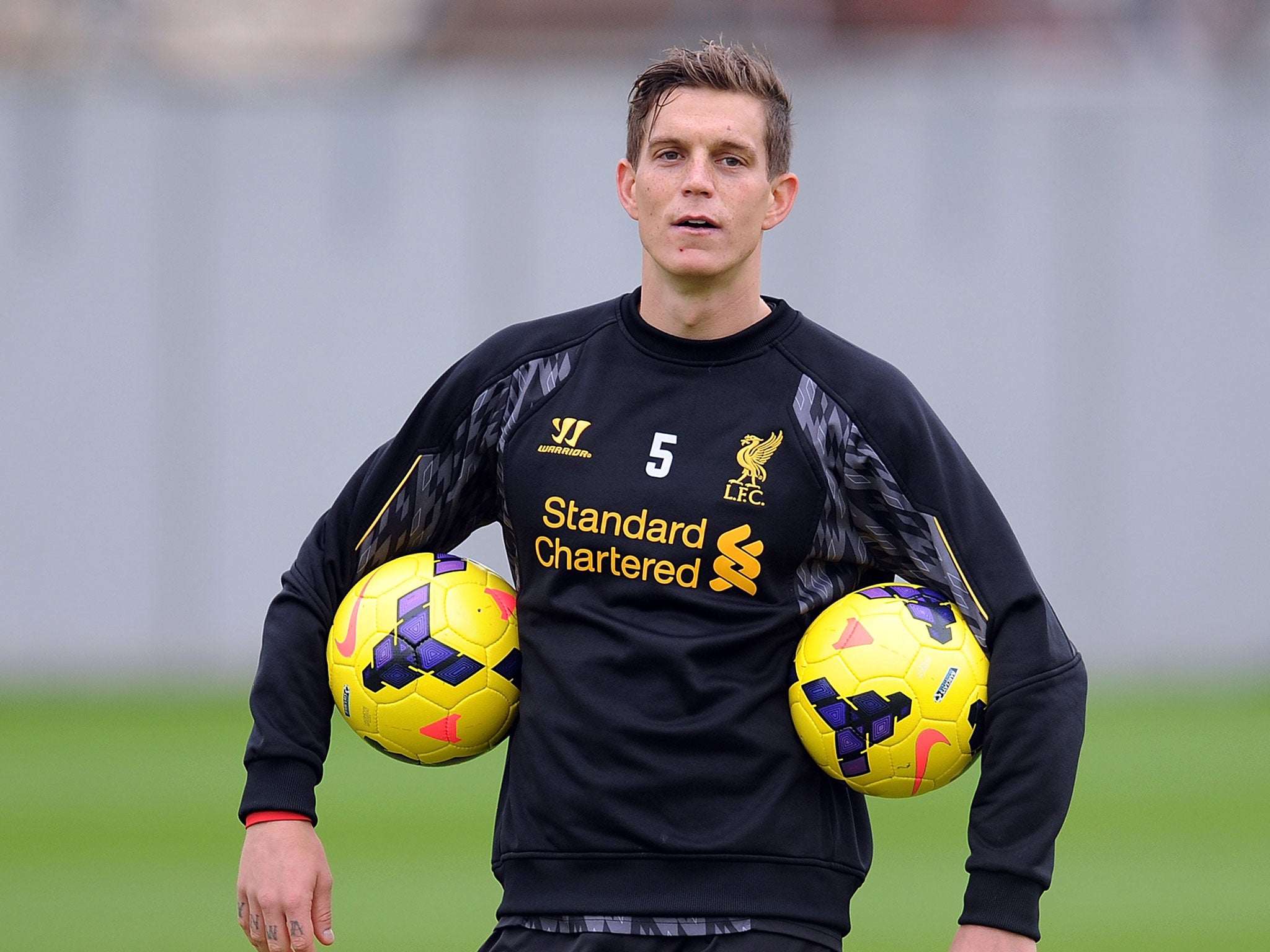 Daniel Agger in action during training with Liverpool