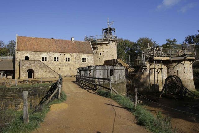 The construction site of the Chateau de Guedelon which started out as an eccentric project is now an established enterprise, employing 65 people and drawing in visitors from around Europe every year