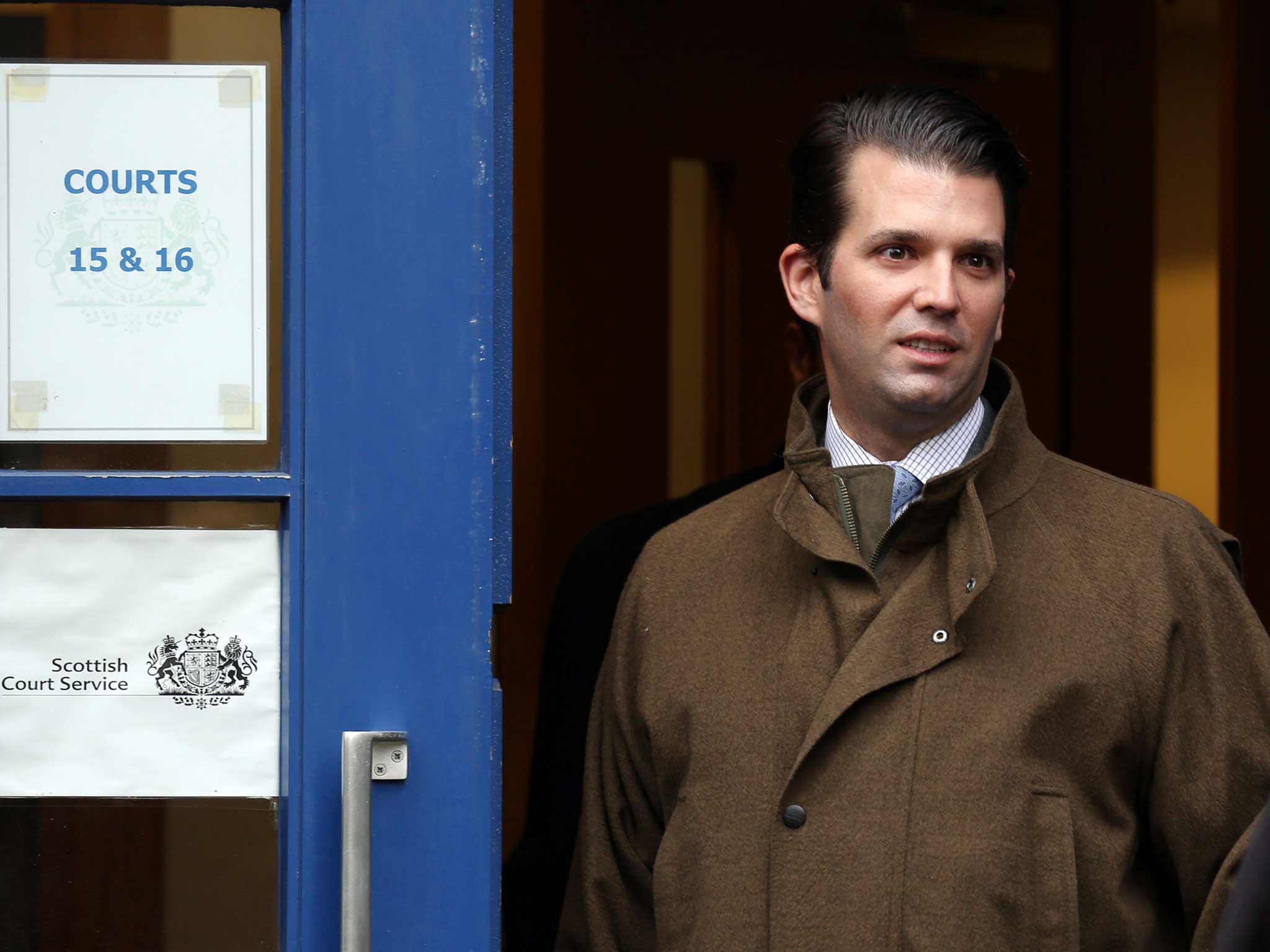 Donald Trump Jr departs an Edinburgh court as lawyers acting for his father US billionaire Donald Trump challenge the legality of a decision to approve an offshore windfarm within view of his golf resort