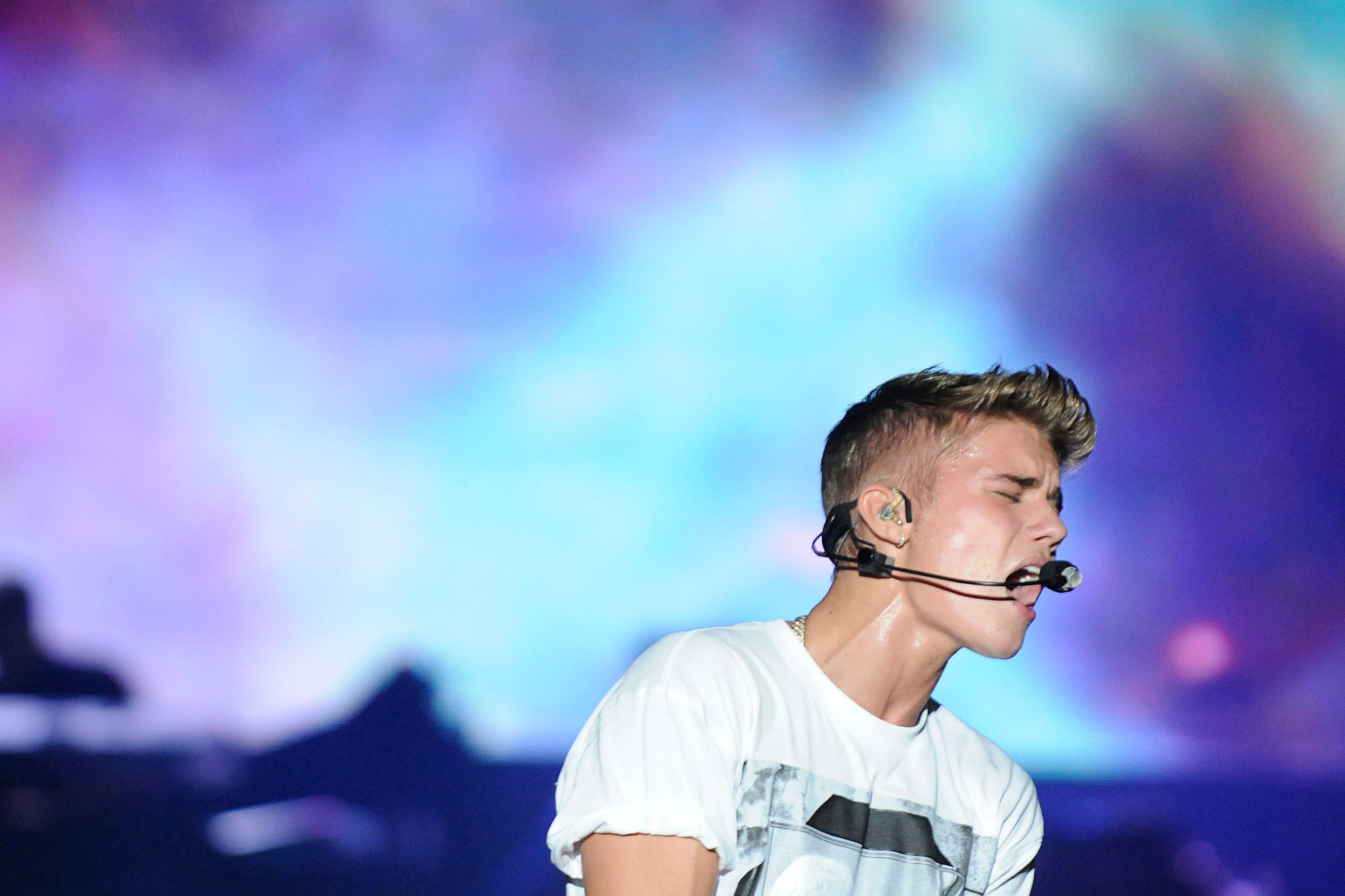 Canadian pop singer Justin Bieber performs during his "Believe" concert at the Olimpic Stadium in Santo Domingo October 22, 2013