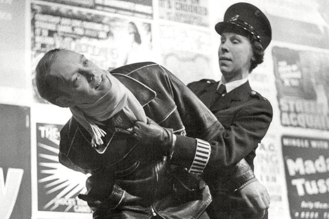 Hicks arrests a juvenile delinquent in ‘The Lily White Boys’ at London’s Royal Court in 1960
