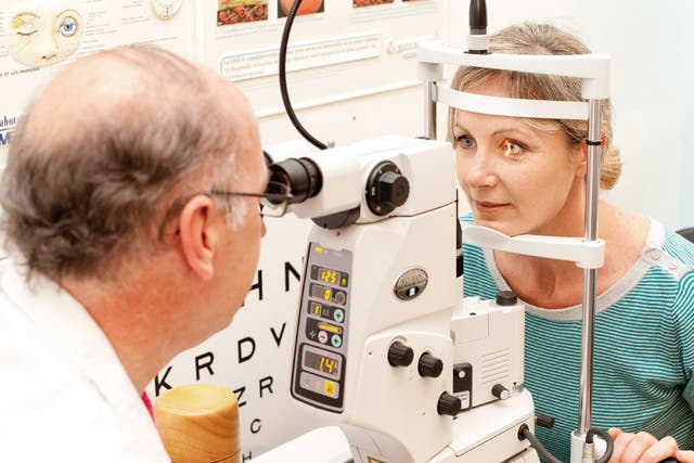 A patient receives an eye examination (file photo)