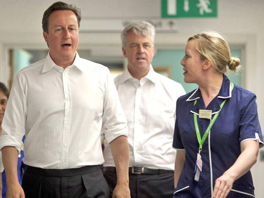 David Cameron in 2009 said, 'With the Conservatives there will be no more of the tiresome, meddlesome, top-down restructures that have dominated the last decade of the NHS'. Andrew Lansley (centre) went on to launch one of the largest reorganisations in N