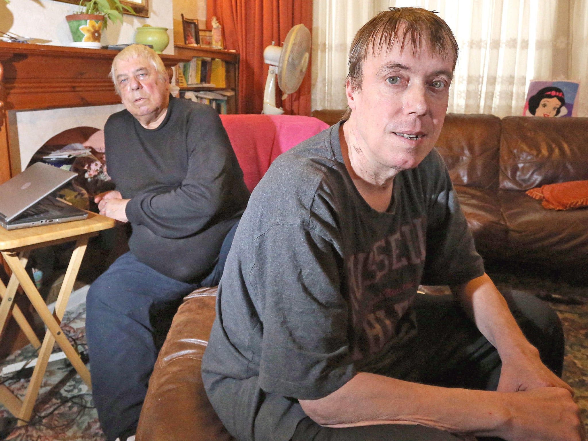 Paranoid schizophrenic Lloyd Drew at home with his father, Ray