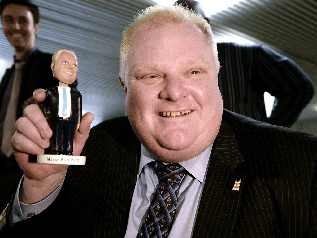 Hundreds of people flocked to Toronto City Hall this week in
hopes of buying a bobblehead doll of Mayor Rob Ford