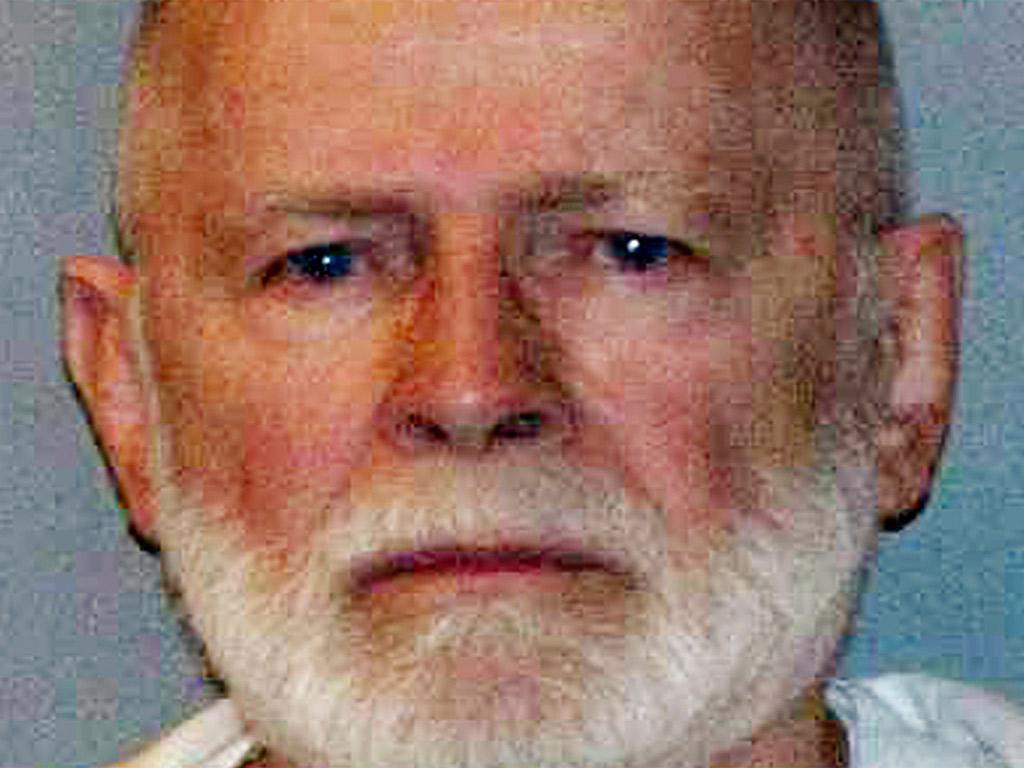Bulger had a stash of 30 guns and $822,000 in cash hidden in the walls of his California apartment when arrested in 2011