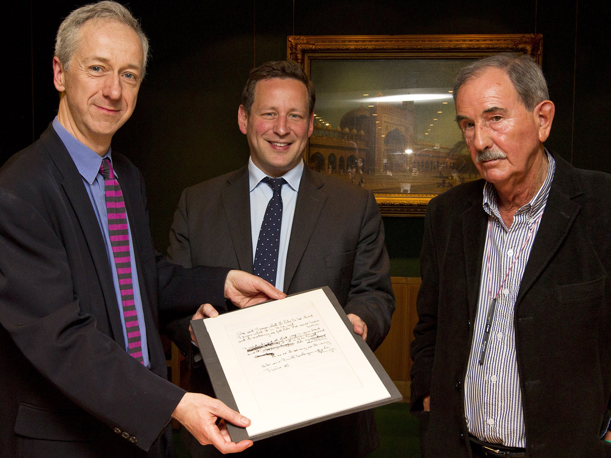 Roly Keating, the chief executive of the British Library, Ed Vaizey, the British Minister for Culture and Hunter Davies, acclaimed Beatles biographer, with the lyrics for the Beatles song 'She Said She Said'