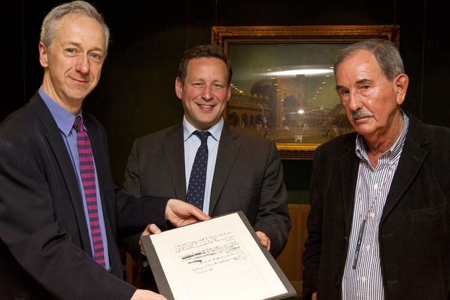 Roly Keating, the chief executive of the British Library, Ed Vaizey, the British Minister for Culture and Hunter Davies, acclaimed Beatles biographer, with the lyrics for the Beatles song 'She Said She Said' 