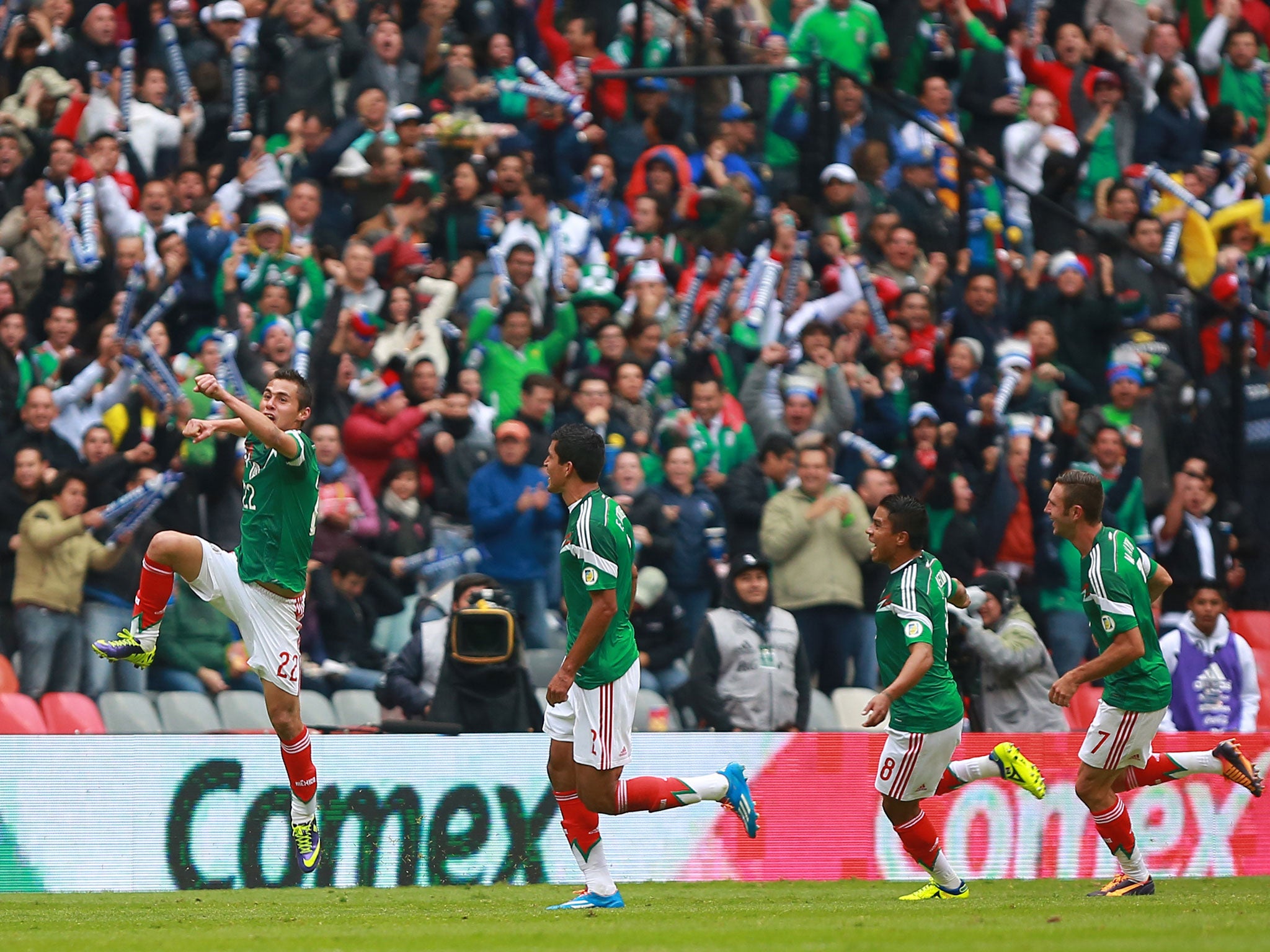 Paul Aguilar celebrates after scoring for Mexico against New Zealand in their 2014 World Cup play-off