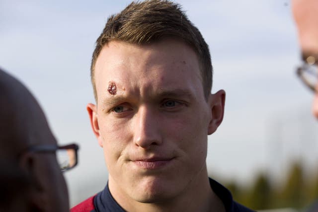 Manchester United and England defender Phil Jones speaks to journalists after training at Arsenal's London Colney training ground