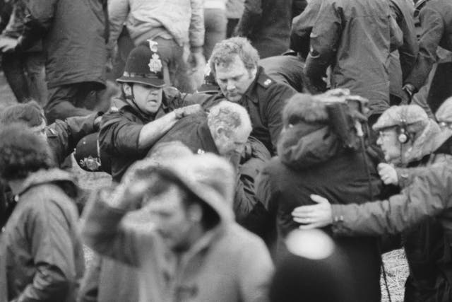 A camera crew fims a scuffle between police and miners at a demonstration at Orgreave Colliery, South Yorkshire, during the miner's strike, 2nd June 1984 - All police forces in England and Wales have been asked to search their files over claims that offic