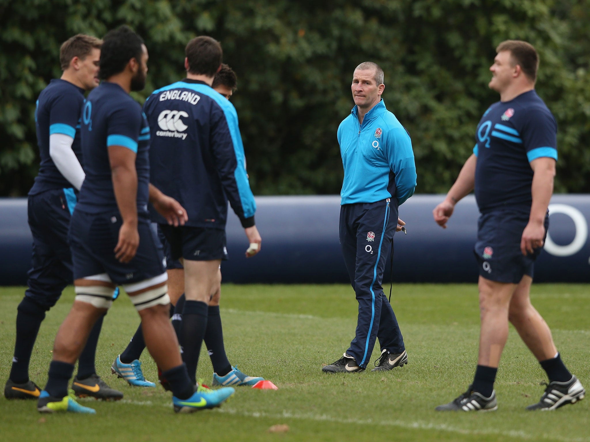 Stuart Lancaster watches England training at Pennyhill Park