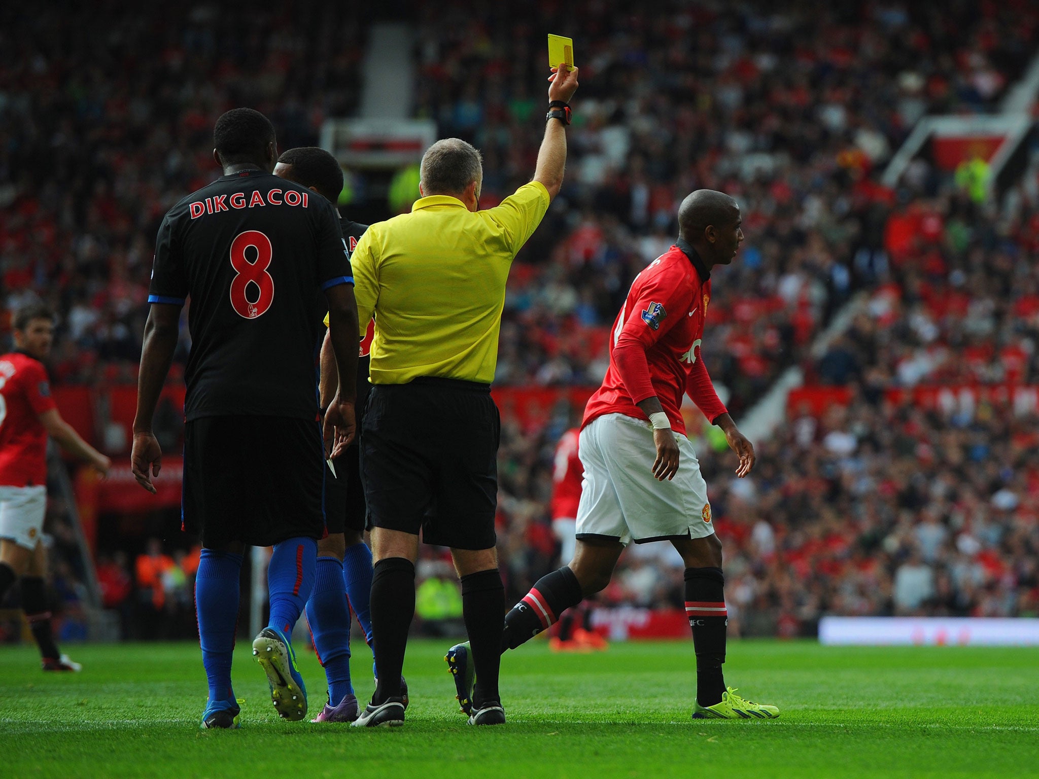 Ashley Young (right) has been involved in several diving controversies this season