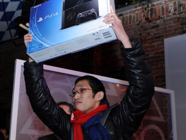 Joey Chiu, 24-year-old from Brooklyn, New York is first on line to receive the new Sony PlayStation FOUR at the Standard High Line in New York