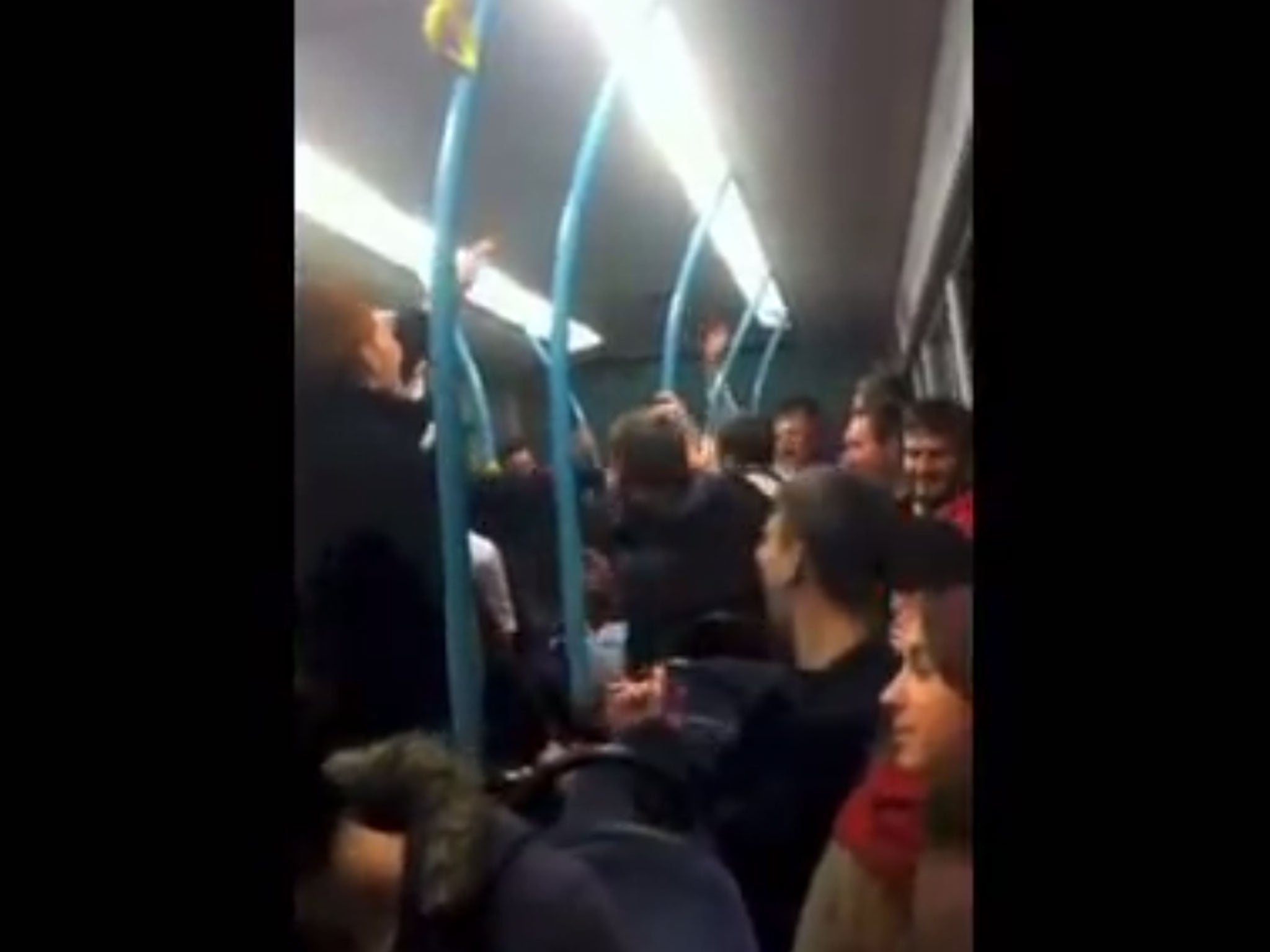 A screenshot of the packed bus during the chanting from the video posted online