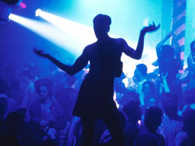 Silhouette of clubber dancing Hacienda nightclub