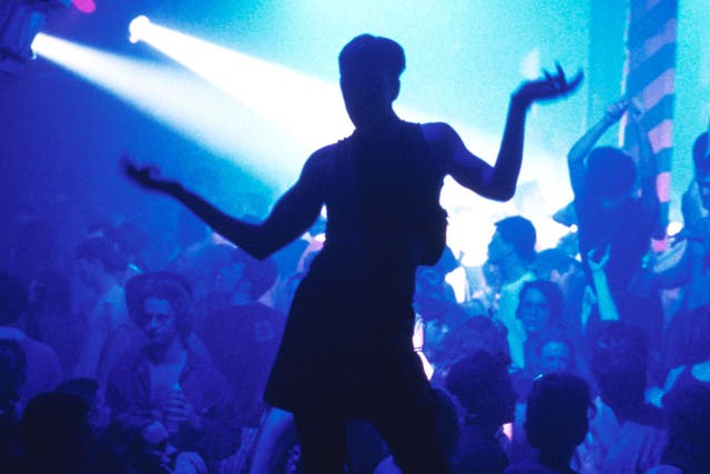 Silhouette of clubber dancing Hacienda nightclub