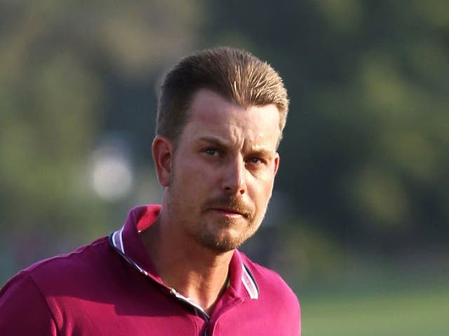 Henrik Stenson hit eight birdies in Dubai yesterday to lead by one shot