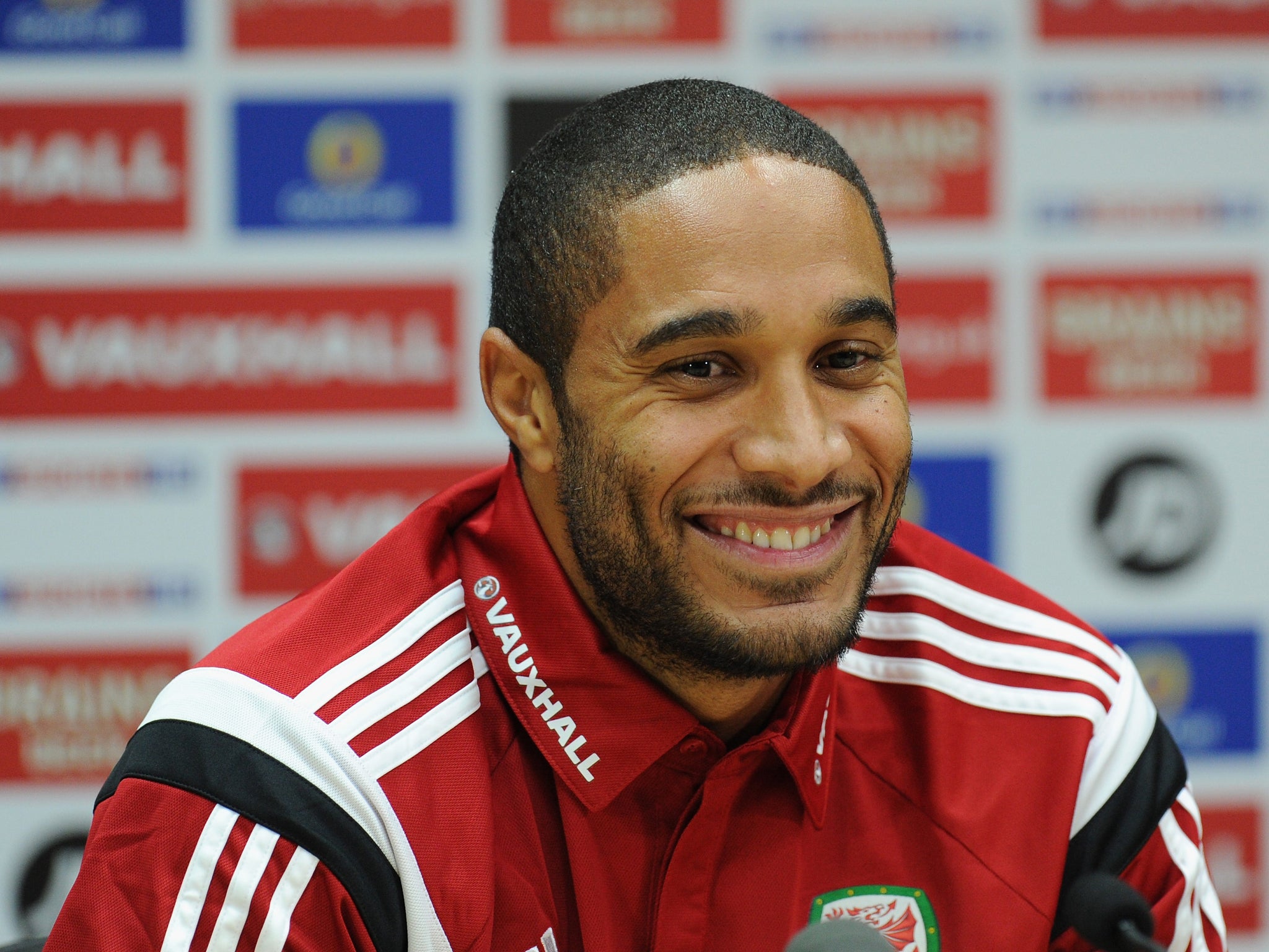 Wales captain Ashley Williams has urged fans to get behind manager Chris Coleman following his two-year contract extension