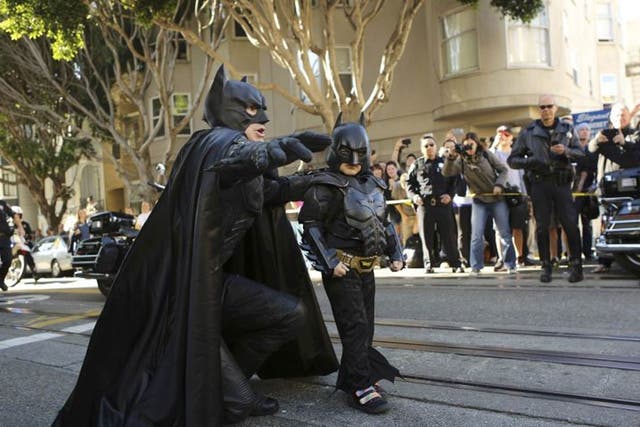 Batkid Miles prepares to rescue a woman in distress