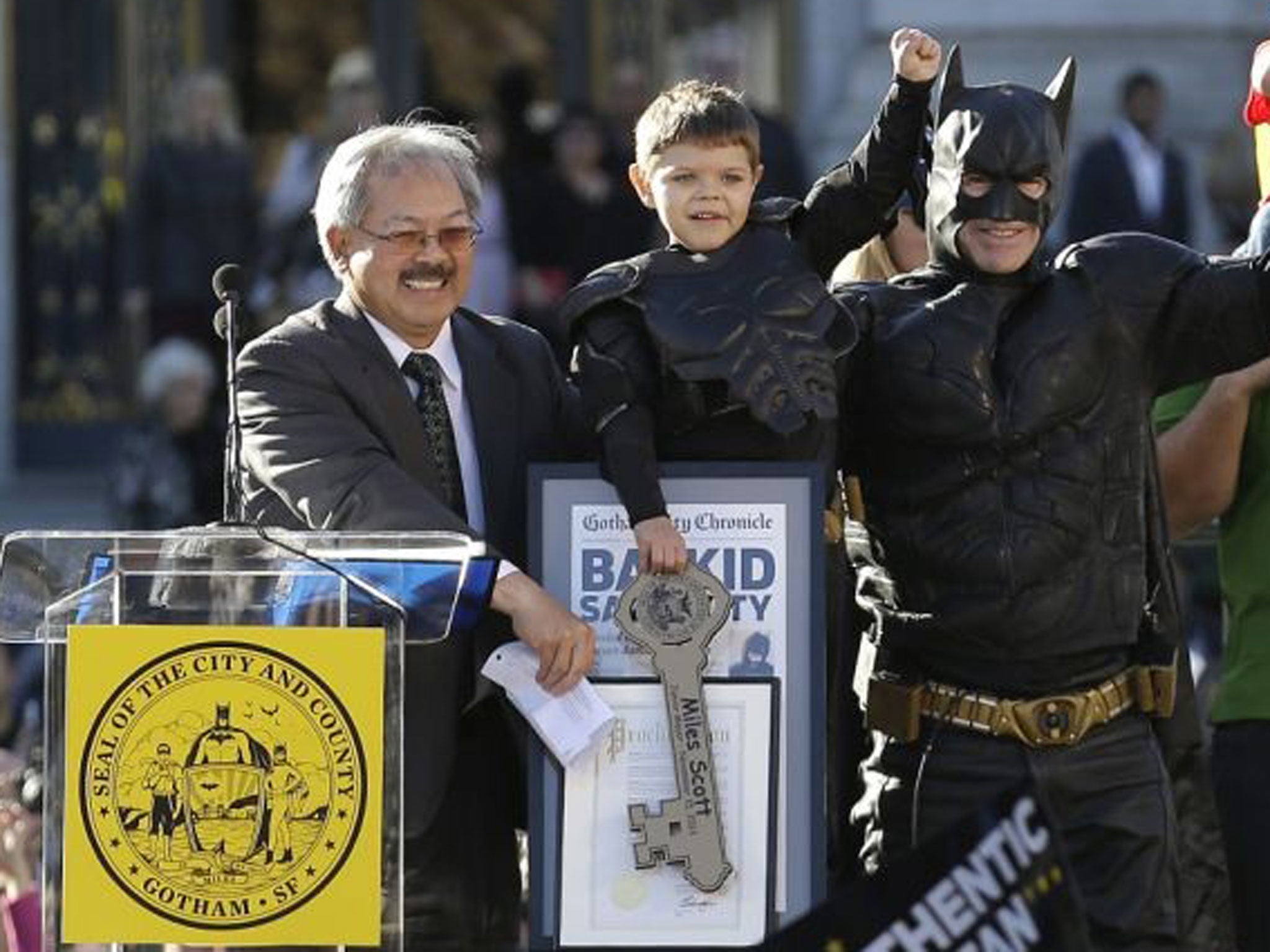 Batkid is handed the key to the city by Mayor Ed Lee