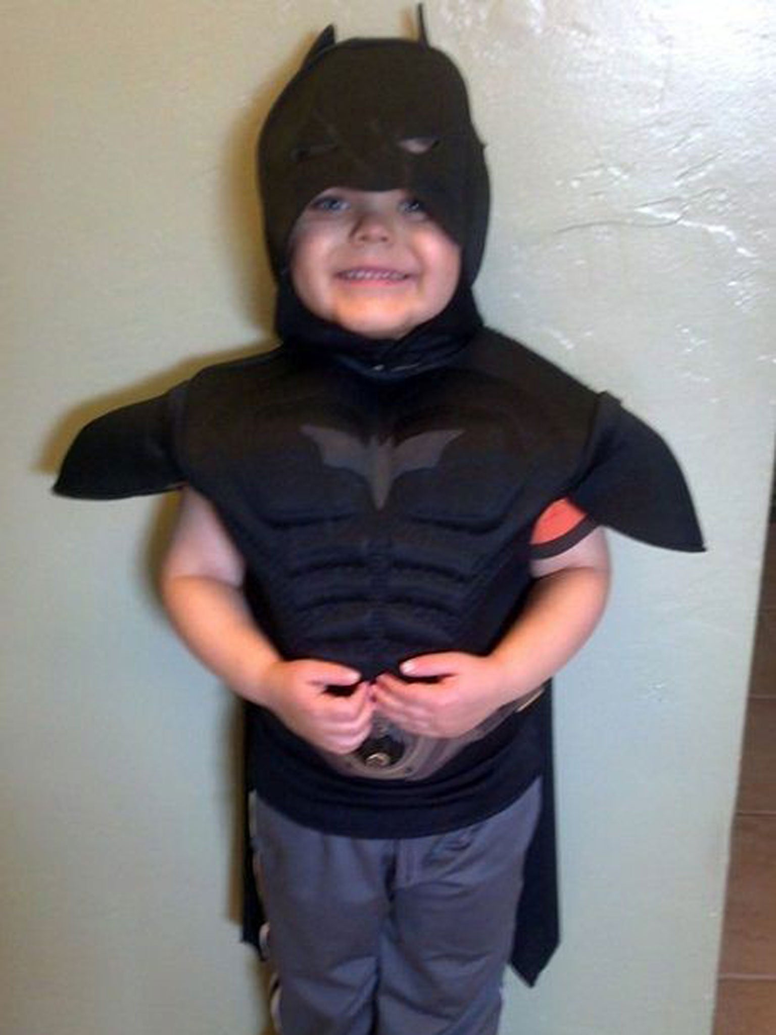 Miles in his Batman costume