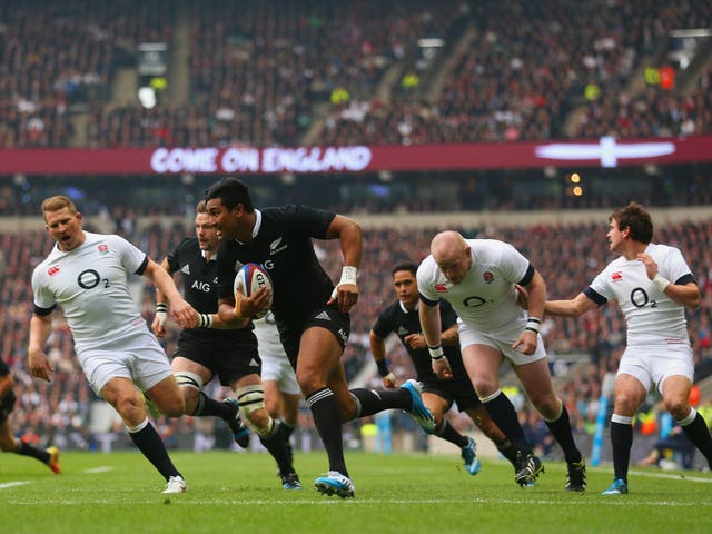 Julian Savea scores his first of two tries in New Zealand's win over England