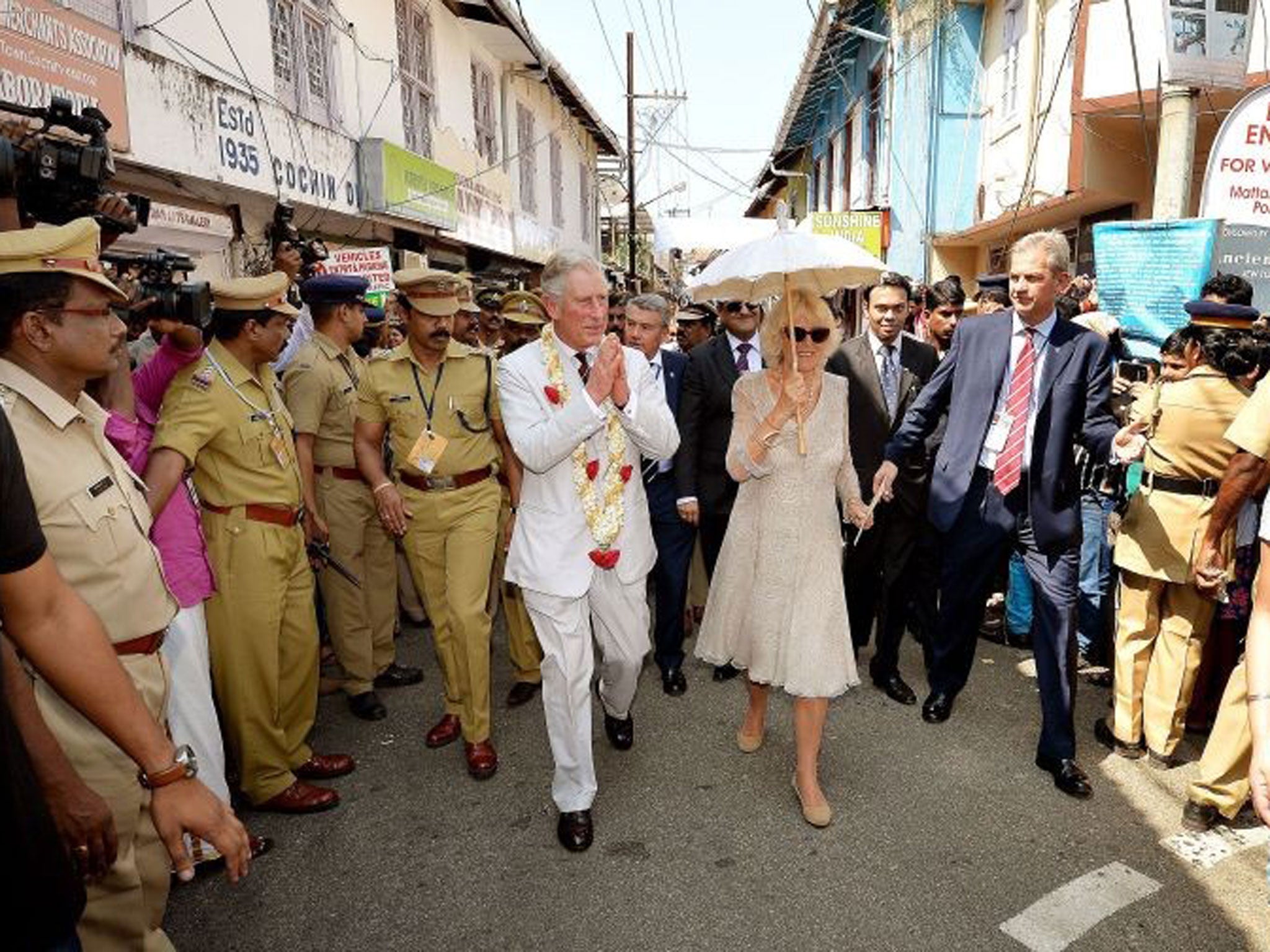 Older, bolder: The Duke and Duchess of Cornwall in Jew Town, Kochi, south-west India on Thursday, his 65th birthday