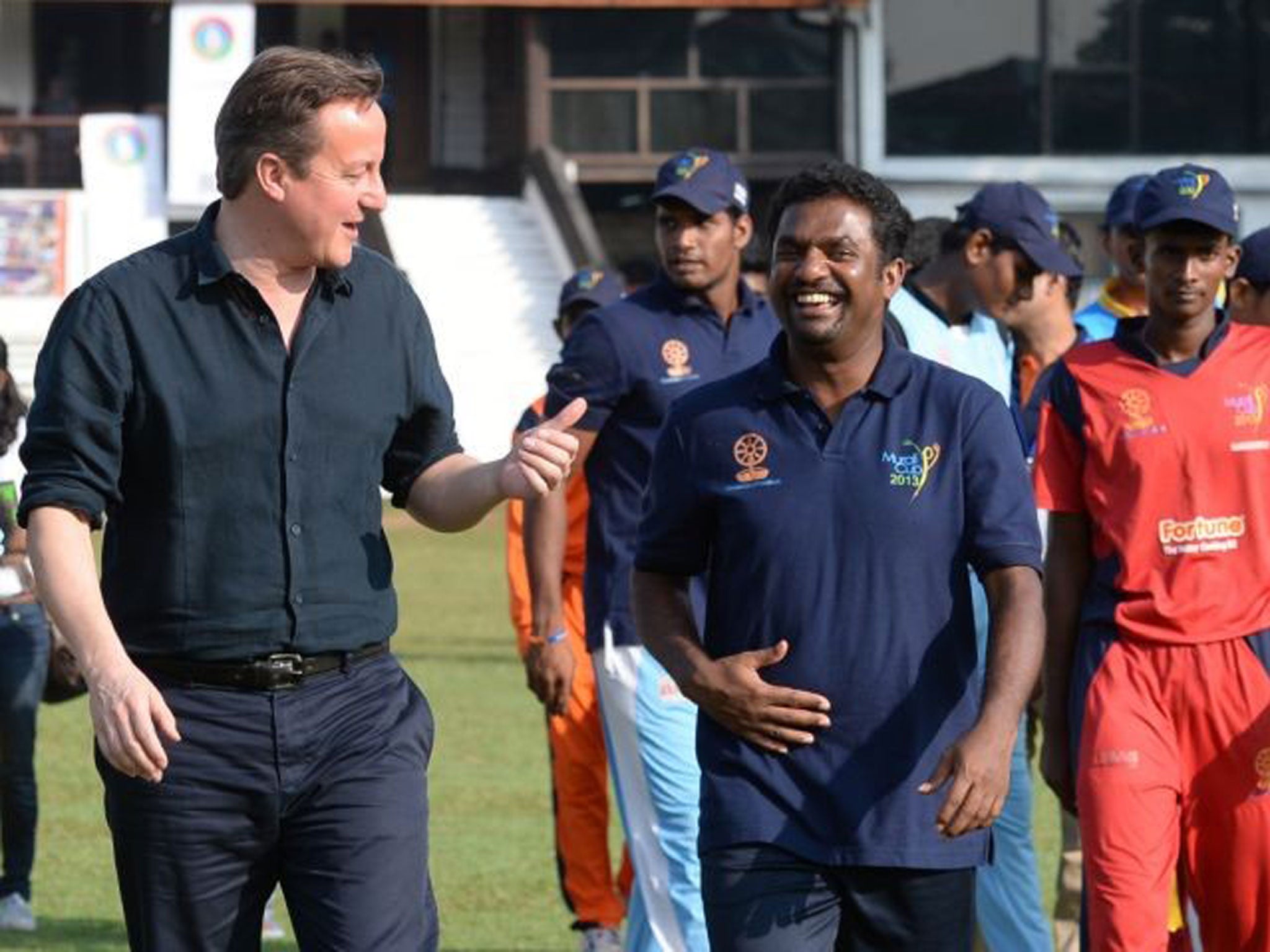 Sticky wicket: David Cameron with cricketer Muttiah Muralitharan