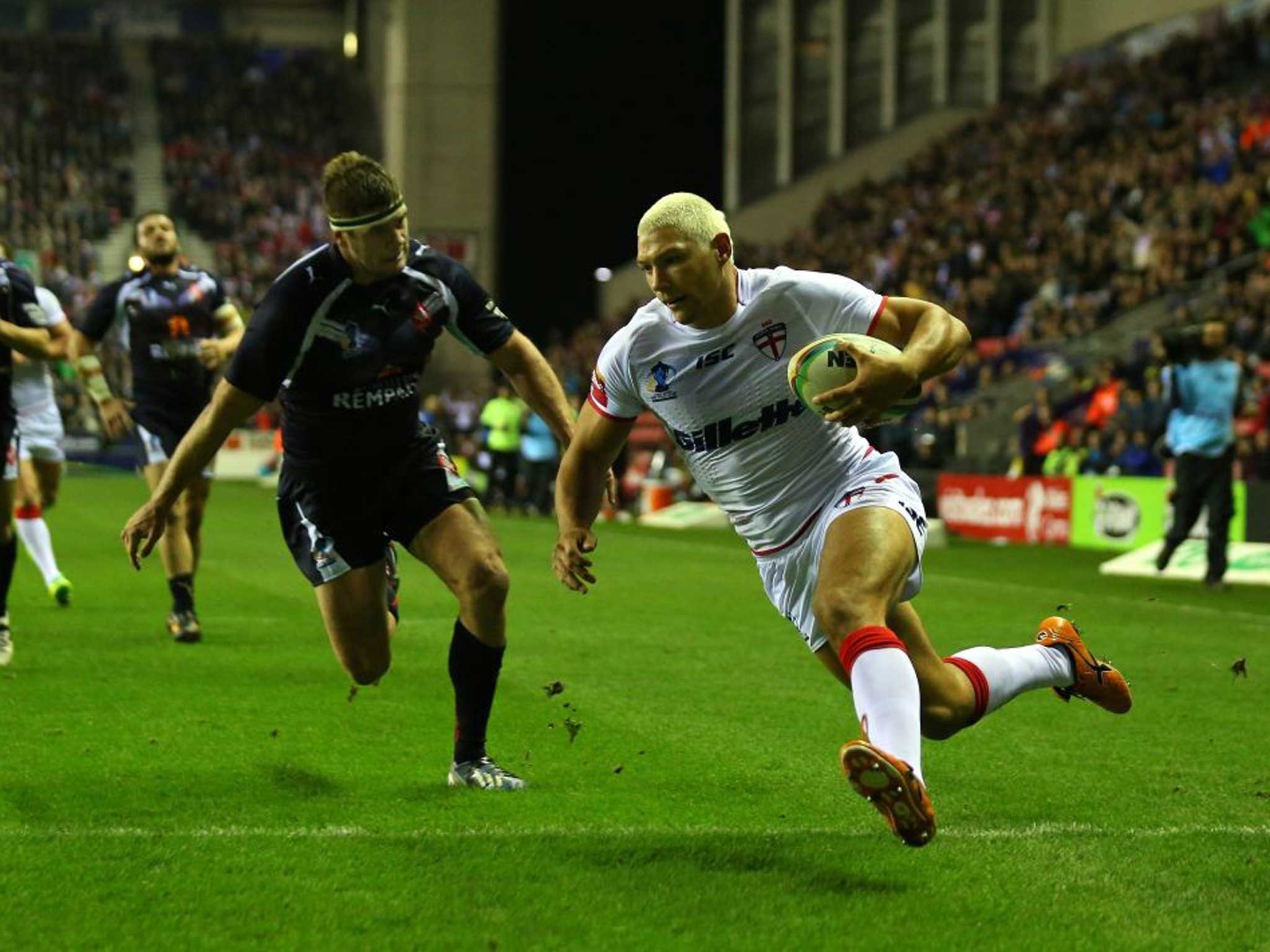 Ryan mighty: England’s winger Ryan Hall scores his second try last night