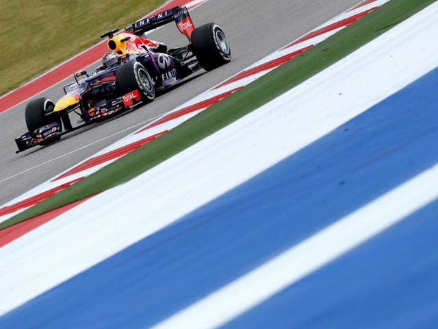 Red Bull's driver Sebastian Vettel of Germany races during the qualifying round for the United States Formula One Grand Prix