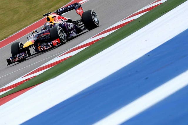 Red Bull's driver Sebastian Vettel of Germany races during the qualifying round for the United States Formula One Grand Prix