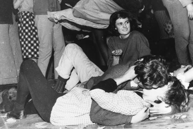 Teenagers cavort on the floor of the Royal Festival Hall in 1959