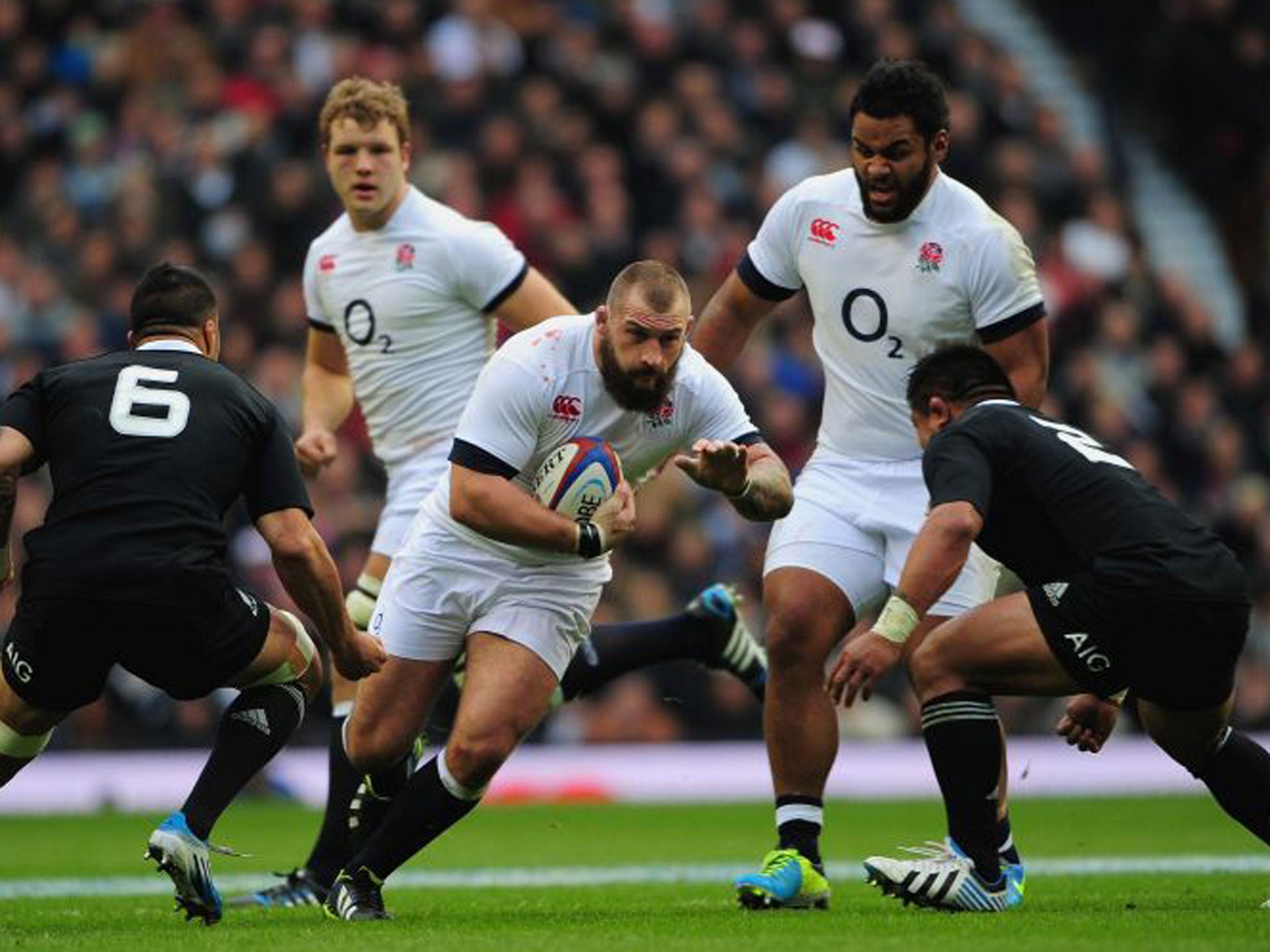 Joe Marler charges through the New Zealand defence on Saturday