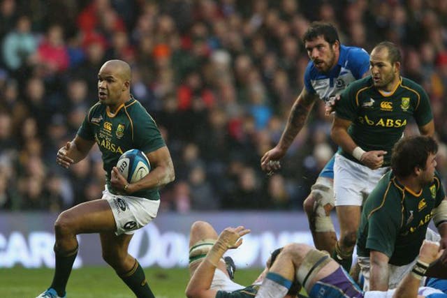 JP Pietersen of South Africa charges upfield in the 28-0 victory over Scotland