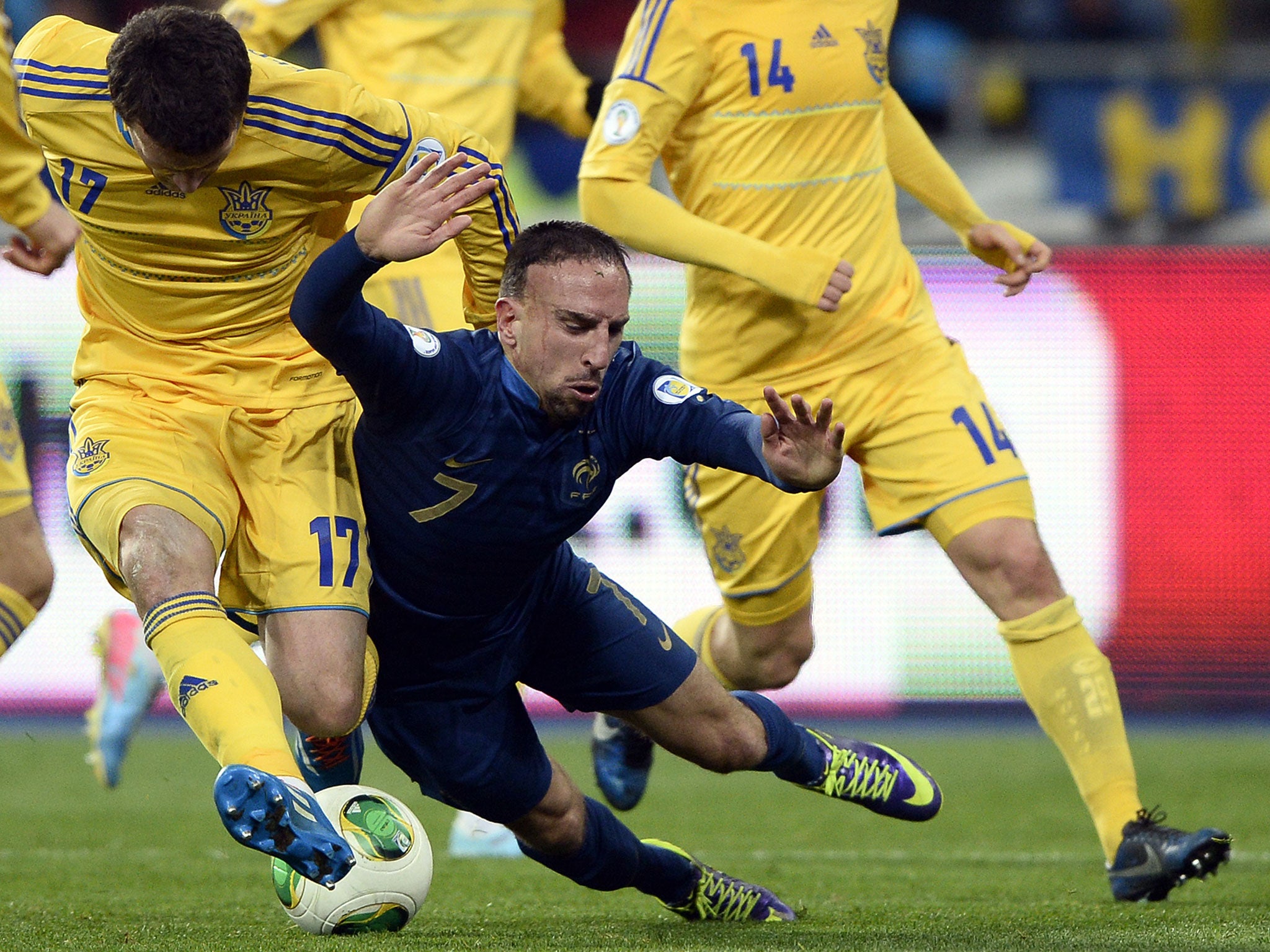 Franck Ribery is brought down during France's 2-0 defeat by Ukraine on Friday