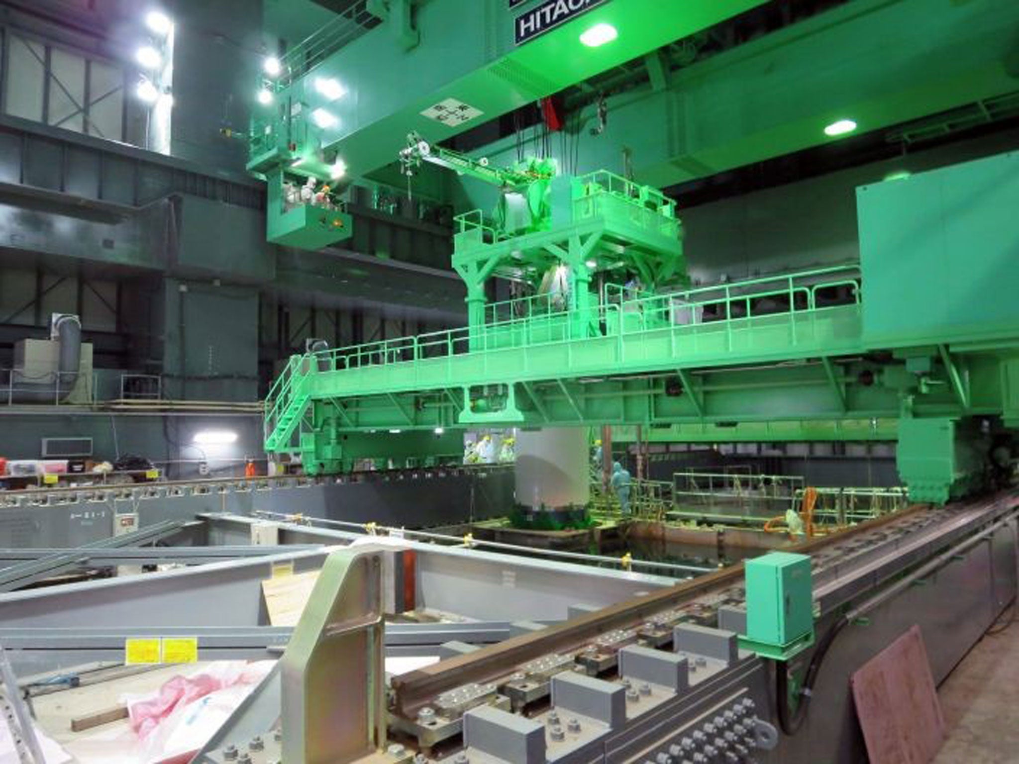 Tepco starts to remove nuclear fuel rods from the spent storage pool of Fukushima's Unit 4 reactor