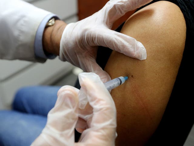 Eligible adults may be given flu vaccine vouchers to use at their local pharmacies