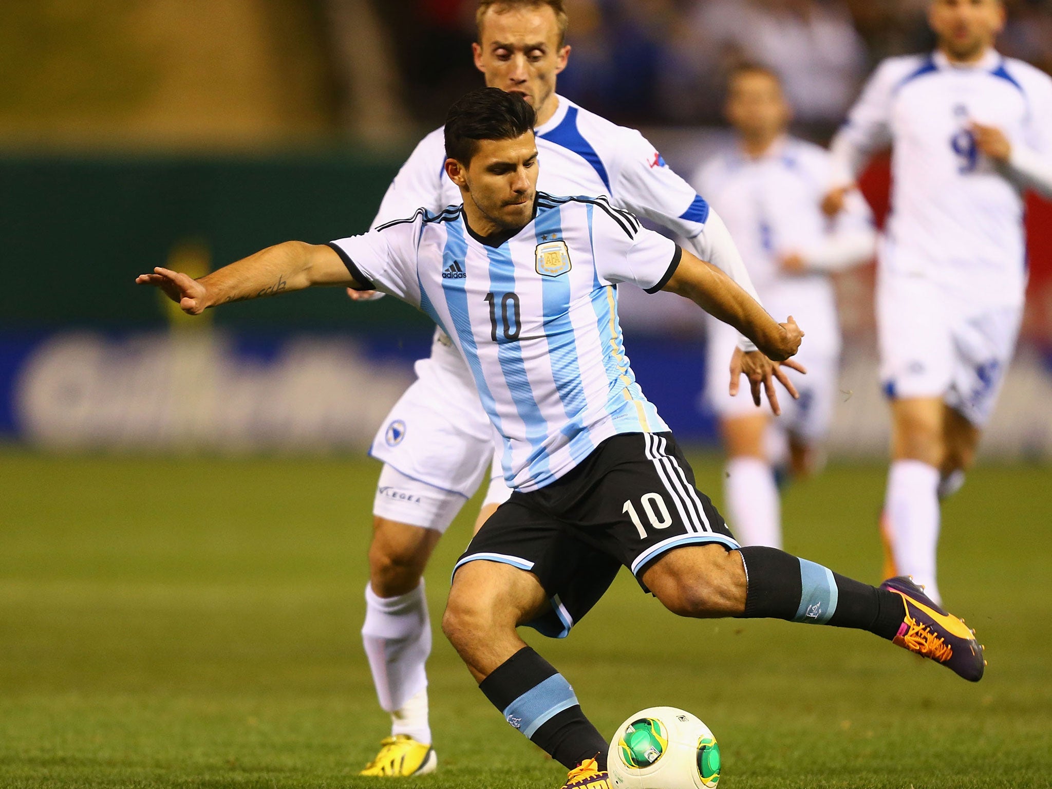 Sergio Aguero takes a shot at goal during Argentina's 2-0 win over Bosnia on Monday