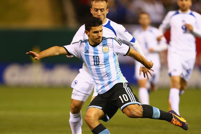 Sergio Aguero takes a shot at goal during Argentina's 2-0 win over Bosnia on Monday