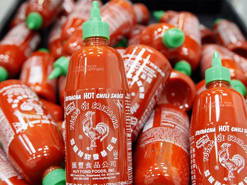 The maker of Sriracha hot sauce is under fire for allegedly fouling the air around its Southern California production site