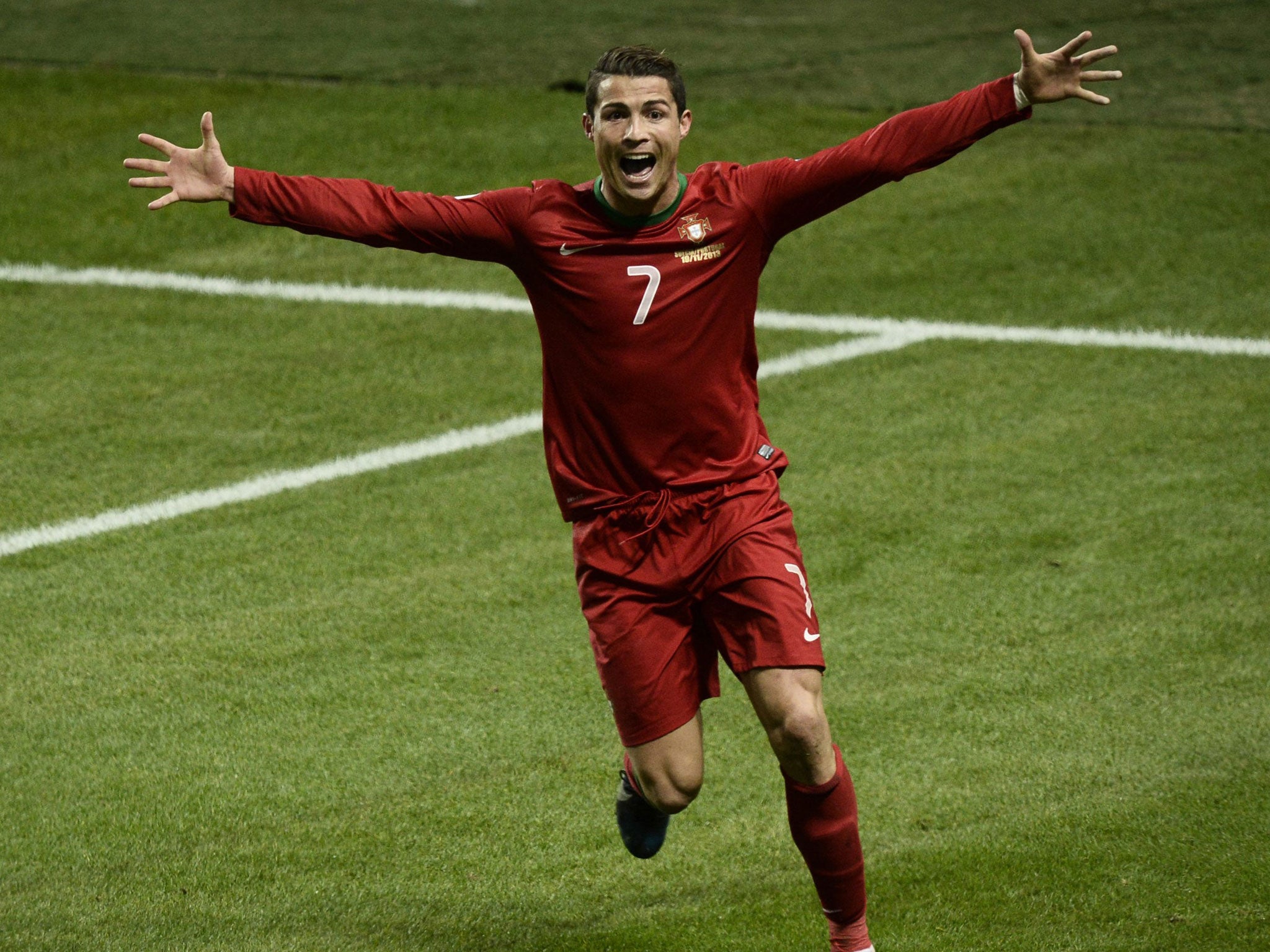 Cristiano Ronaldo celebrates his hat-trick against Sweden