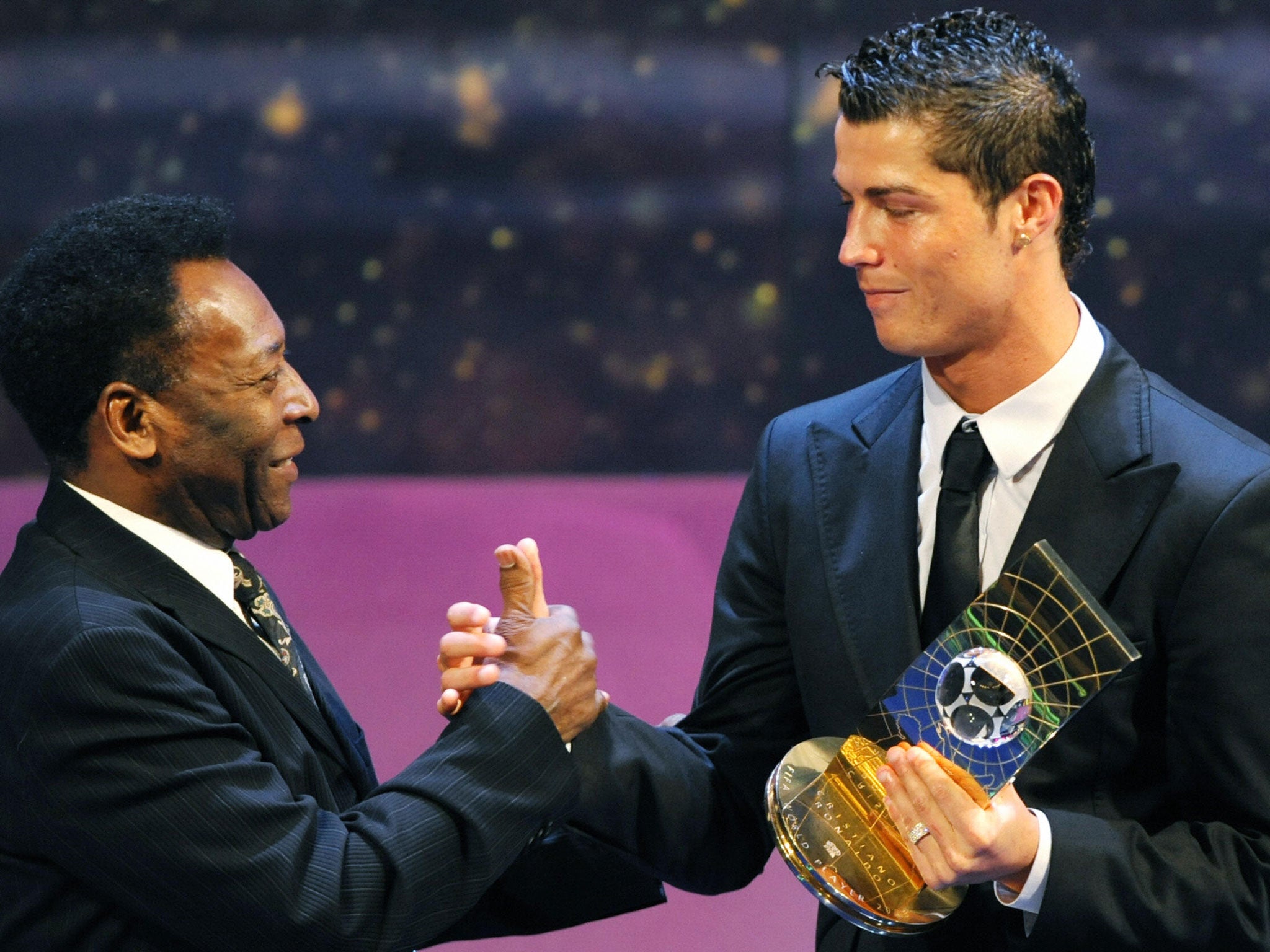Cristiano Ronaldo (right) receives the Ballon d'Or award from Pele in 2008