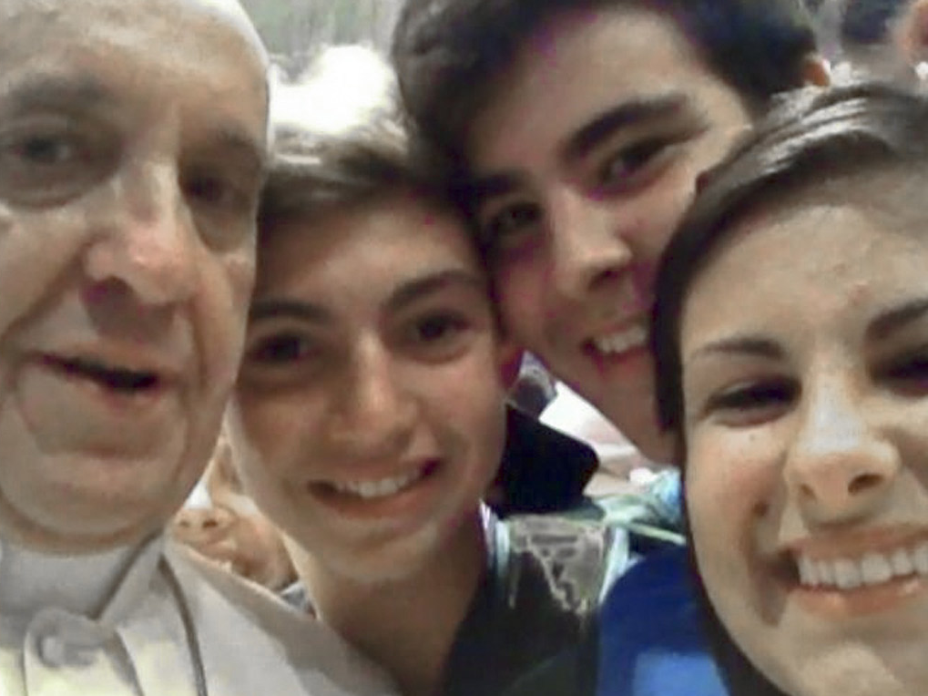 The Pope poses for a 'selfie' in August