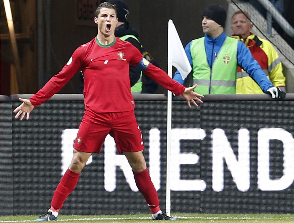 Cristiano Ronaldo celebrates one of his goals against Sweden on Tuesday night