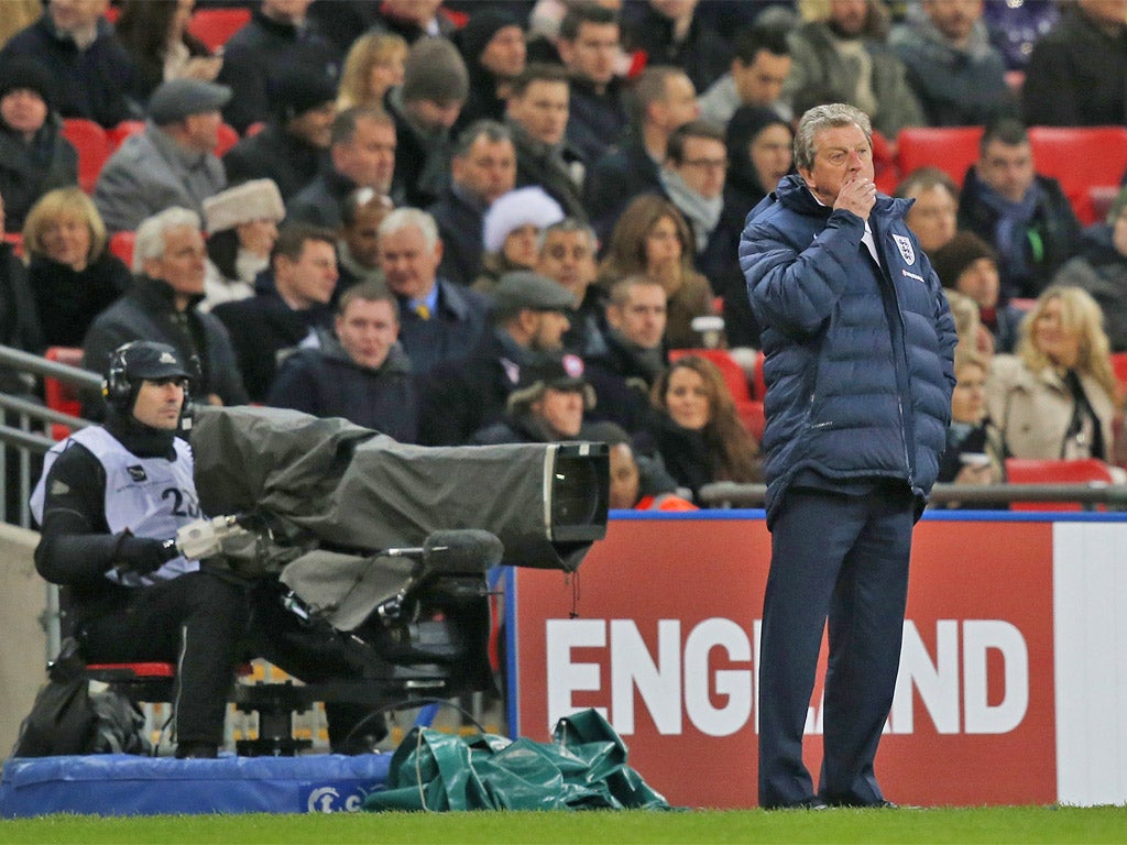 A pensive Roy Hodgson watches England lose to Germany at Wembley on Tuesday