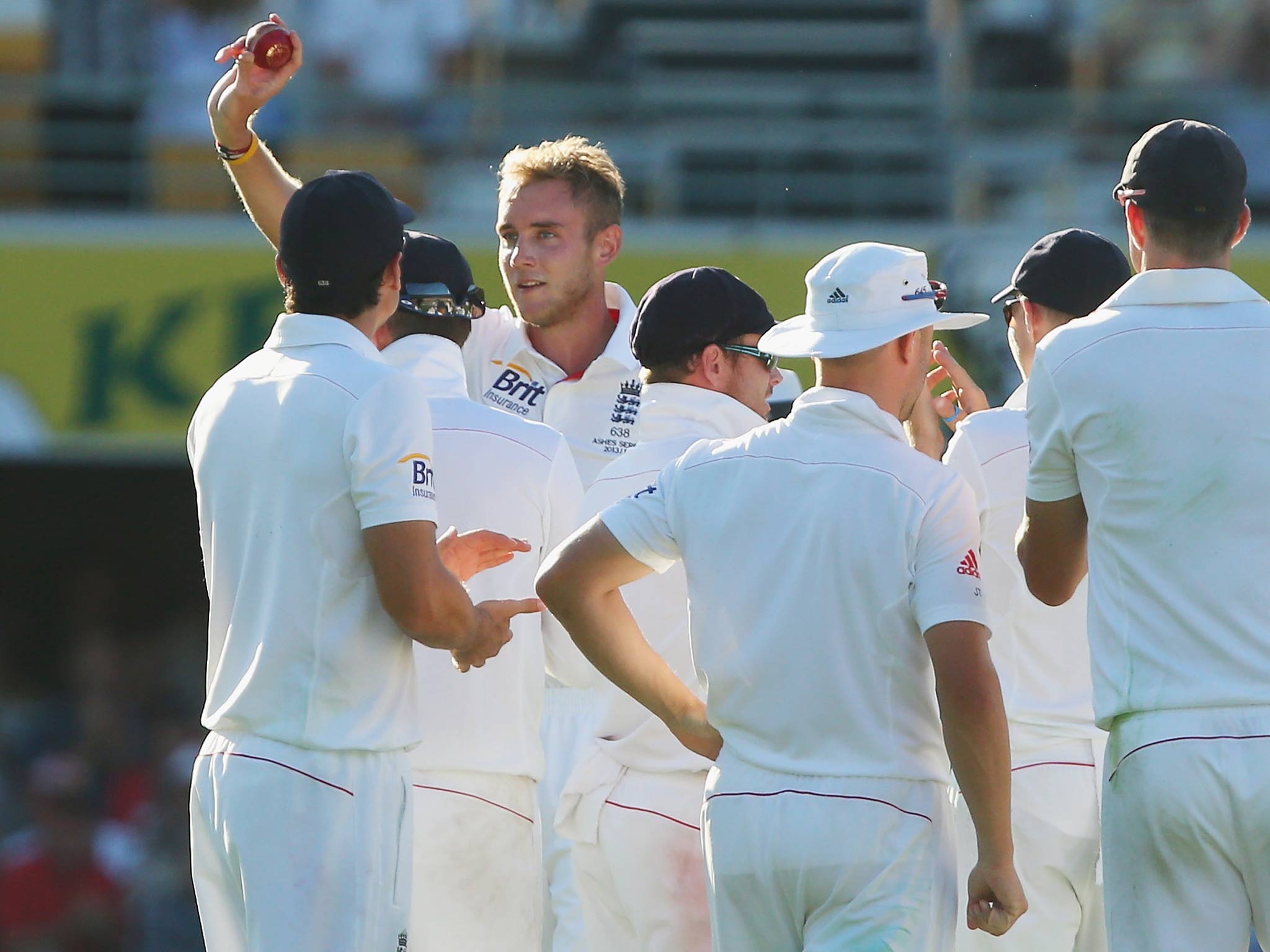 Stuart Broad of England shows the ball to the crowd after dismissing Mitchell Johnson of Australia during day one of the First Ashes Test match between Australia and England at The Gabba