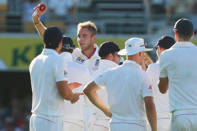  Stuart Broad of England shows the ball to the crowd after dismissing Mitchell Johnson of Australia during day one of the First Ashes Test match between Australia and England at The Gabba 